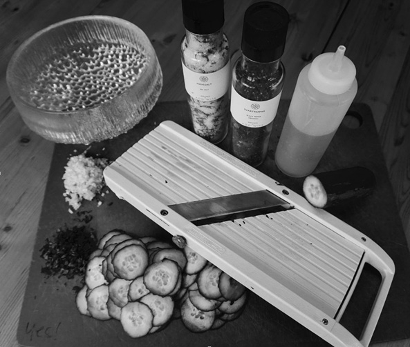 Cutting board, mandolin, and ingredients