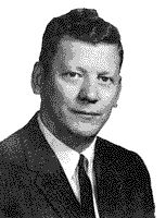 Portrait of Carroll J. Peterson in a suit and tie