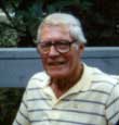 C. Leslie Strand in a striped shirt
