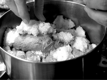 Cake being assembled